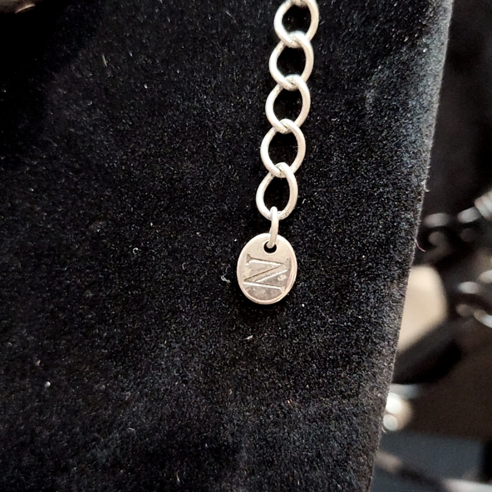 Bold Yet Elegant Silver Flower Statement Necklace - Picture 6 of 6